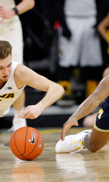 Iowa stuns No. 5 Michigan 74-59